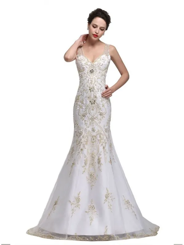 Abito da Sposa a Sirena con applicazioni oro e scollo a V con trasparenze e bottoncini sulla schiena
