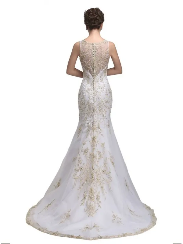 Abito da Sposa a Sirena con applicazioni oro e scollo a V con trasparenze e bottoncini sulla schiena