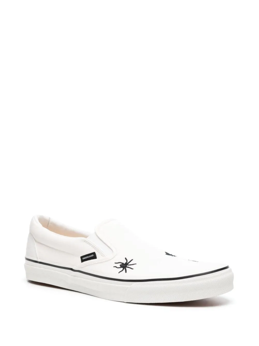 Sneakers slip-on con dettagli ricamati in bianco - uomo